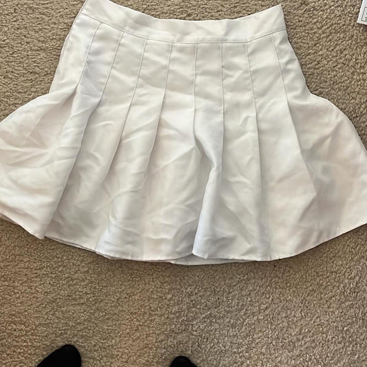 White pleated skirt
